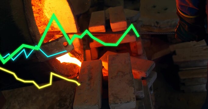 Pouring crucible releasing molten metal into molds in foundry, with gloved hand and digital graphs