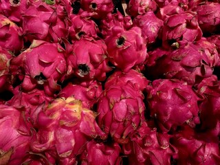 Fresh dragon fruit sold in the market. Dragon fruit contains many nutrients that are good for the body.