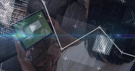 Woman in striped blouse analyzing data charts on tablet in office lounge, with digital overlays