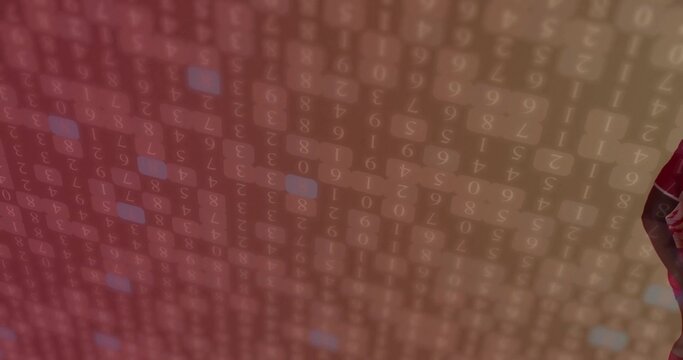 Streaming translucent numeric digits cascading across red digital grid, forming code background - Powered by Adobe