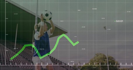 Athlete in sportswear holding soccer ball above head before bleachers, with data overlay