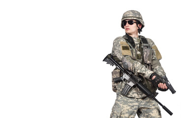 Fototapeta premium Soldier with a pistol in his hands prepares to shoot