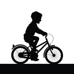 Obraz premium Silhouette of a Joyful Child Riding a Bicycle Outdoor Fun