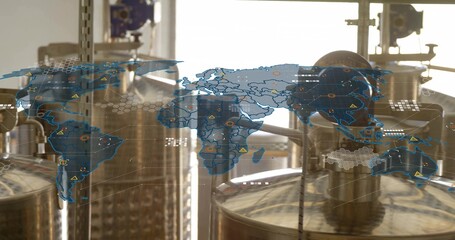 Showing two steel fermentation tanks gleaming in brewery with world map overlay and warnings