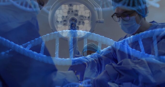 Surgical team in blue gowns performing surgery in operating room, with light and DNA helix graphic