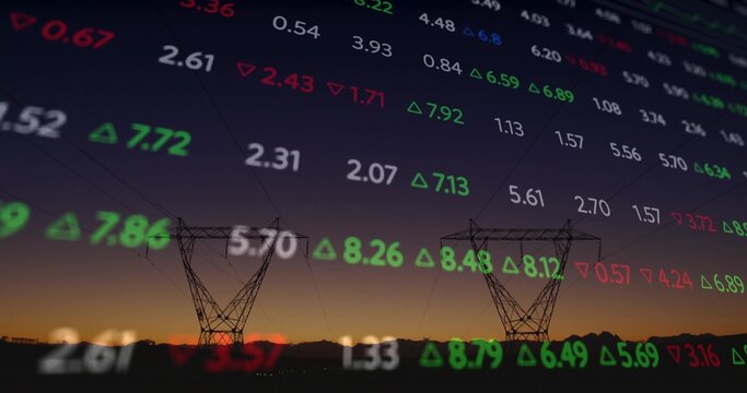 Featuring two transmission towers with lines in field at dusk with floating red green stock numbers