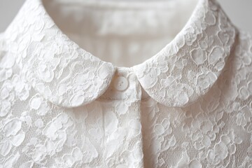 Obraz premium A shirt with refined white lace accents hangs indoors in a warm and inviting atmosphere during the day