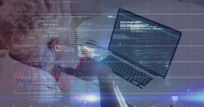 Mature African American man reviewing code with graph overlays at office desk, with laptop