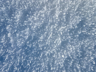 Snow structure is full of small frozen snowflakes