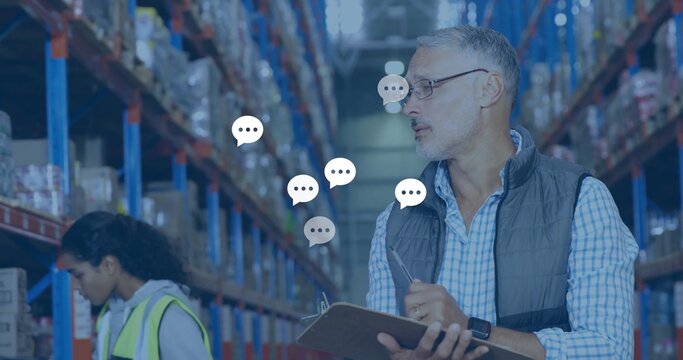 Recording warehouse manager entering inventory on clipboard in warehouse aisle with racks and boxes - Powered by Adobe