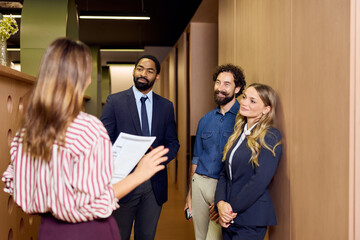 Group of Professionals Having a Discussion in a Modern Office Setting