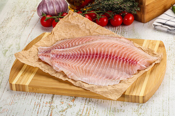 Raw Tilapia fish fillet slice