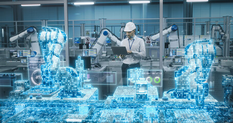 Caucasian Engineer Standing in an Industrial Facility, Using Laptop at an Electronics Factory....