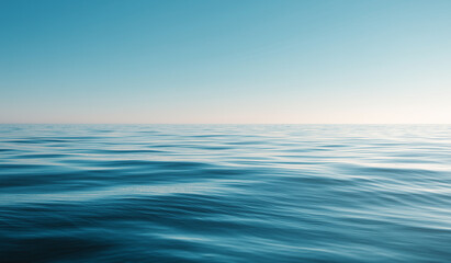 Obraz premium Blue ocean horizon with gentle waves- minimal sea background for summer sale banners