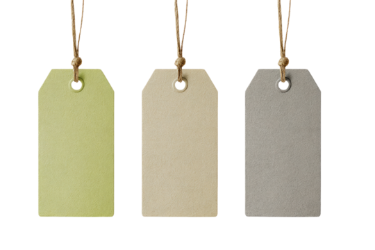 Three blank paper tags, light yellowish-green, beige, and gray-beige, hang from light brown string.  Each tag has a small metal eyelet and knotted string