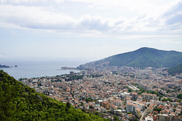 Coastal City Panorama with Mountains in Background