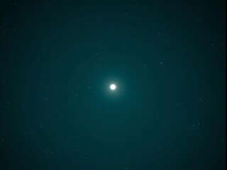 Fototapeta premium Distant bright light in the deep dark night sky