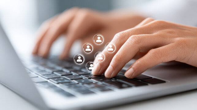Collaborative networking and communication concept with hands typing on laptop featuring people icons for business connection and technology