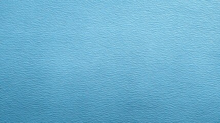 Exploring the elegance of light blue leather fabric texture under soft lighting for crafting and design inspiration