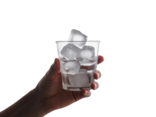 Hand Holding a Glass of Ice Cubes
