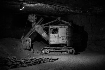 old excavator  in underground mine