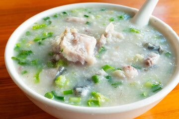 angle view porridge with fish at horizontal composition