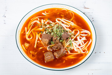 angle view spicy beef noodles with soup at horizontal composition
