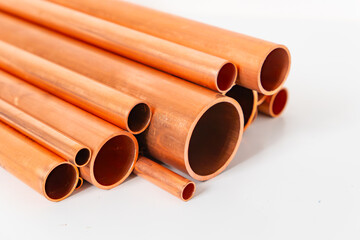 set of copper pipes in various sizes