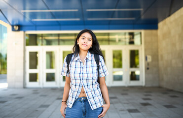 Happy teen high school student outside on summer season