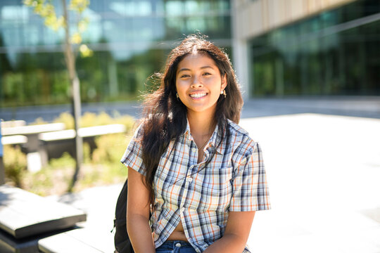 Happy teen high school student outside on summer season