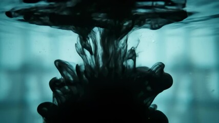 Ink filaments curl and billow in clear water with velvet plumes - Powered by Adobe