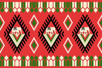 Festive ethnic pattern with decorative elephants, snowflakes, and geometric designs in red, green, and cream on black background, perfect for Christmas and holiday themes.