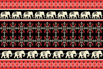 Festive ethnic pattern with decorative elephants, snowflakes, and geometric designs in red, green, and cream on black background, perfect for Christmas and holiday themes.