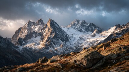 Majestic sunlight illuminating snowy peaks in the french alps
