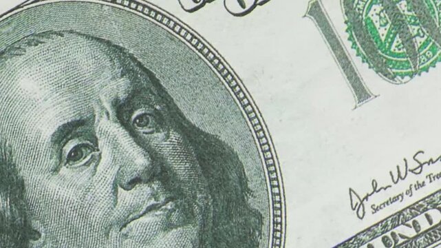 Abstract concept of a 100-dollar bill with variable inversion effect. 4K