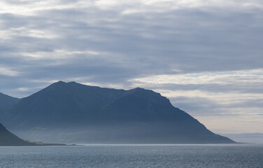 mountains and sea in fjord Borgarfjordur in Iceland