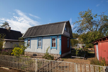 Small country house with a plot. Typical houses given in the post-Soviet space.
