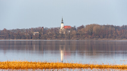 landscape with Burtnieki Lake, calm water of the lake with reflections, fragments of natural objects, Burtnieki Lake, Valmiera Region, Latvia