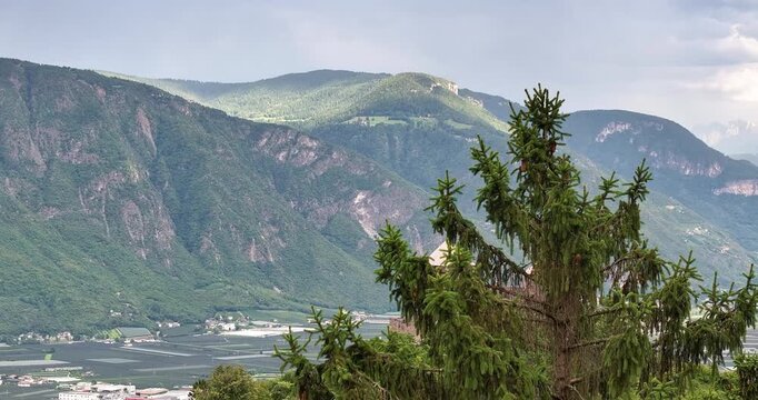 Drone view over Etschtal valley with historic building foreground