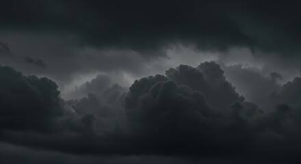 Dark, ominous storm clouds gathering in a turbulent and dramatic sky before a thunderstorm.