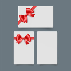 Gift Cards with Red Ribbon Bows Festive Red Ribbon Bows on White Background