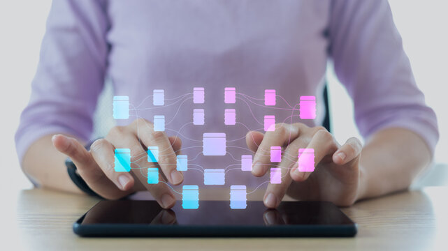 Businesswoman using a tablet with a digital workflow automation process, business management, and a network system. Concept of efficiency, productivity, AI, and modern business technology.