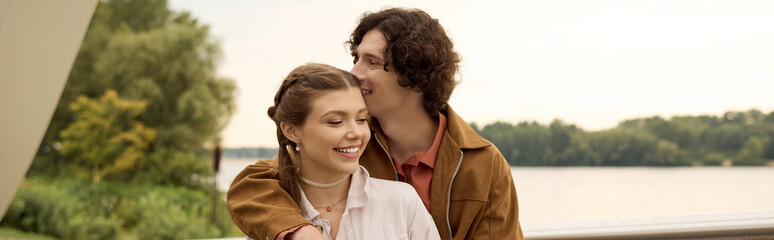 Loving couple enjoys a romantic walk together in the beautiful outdoor park setting