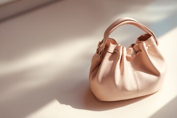 Elegant Beige Leather Handbag Displayed in Soft Natural Light on Minimalistic Background, Featuring Contemporary Design and Practical Handles