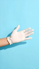 A light, clean, and simple image of a hand wearing a white latex glove against a vivid blue background.