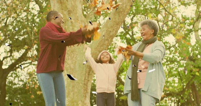 Mother daughter grandmother exchanging glances and flinging autumn leaves skyward for marketing