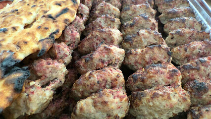 Close up grilled minced meat kebab with bread. High quality photo