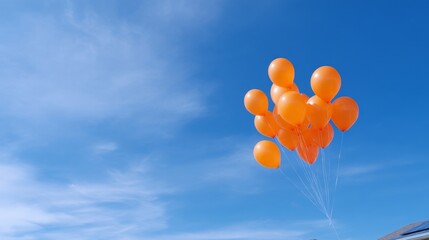 A bunch of vibrant orange balloons floating against a bright blue sky. This cheerful image captures the essence of joy and celebration, perfect for festive occasions or uplifting designs. AI