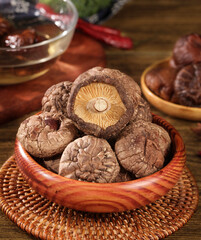 Dried Shiitake Mushrooms in Wooden Bowl - Traditional Asian Cooking Ingredients Still Life