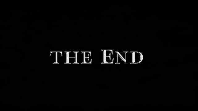 Classic 'The End' title card in a vintage video style, featuring bold white text on a black background, captured from a straight-on camera angle. Live desktop wallpaper.